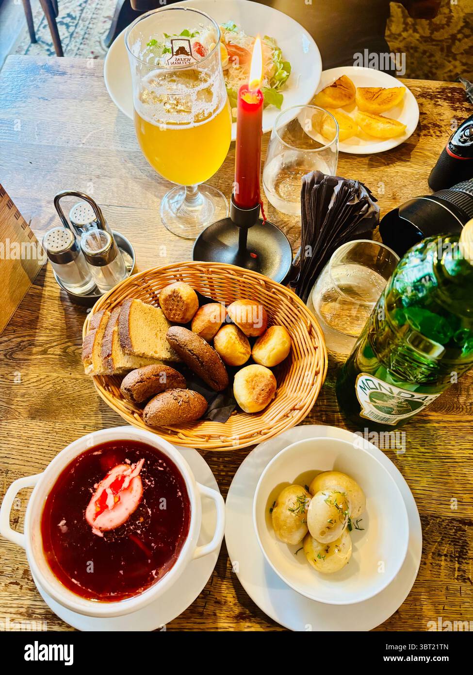 Beetroot Borscht soup with a basket of bread. - Smartphone Captured Stock Image