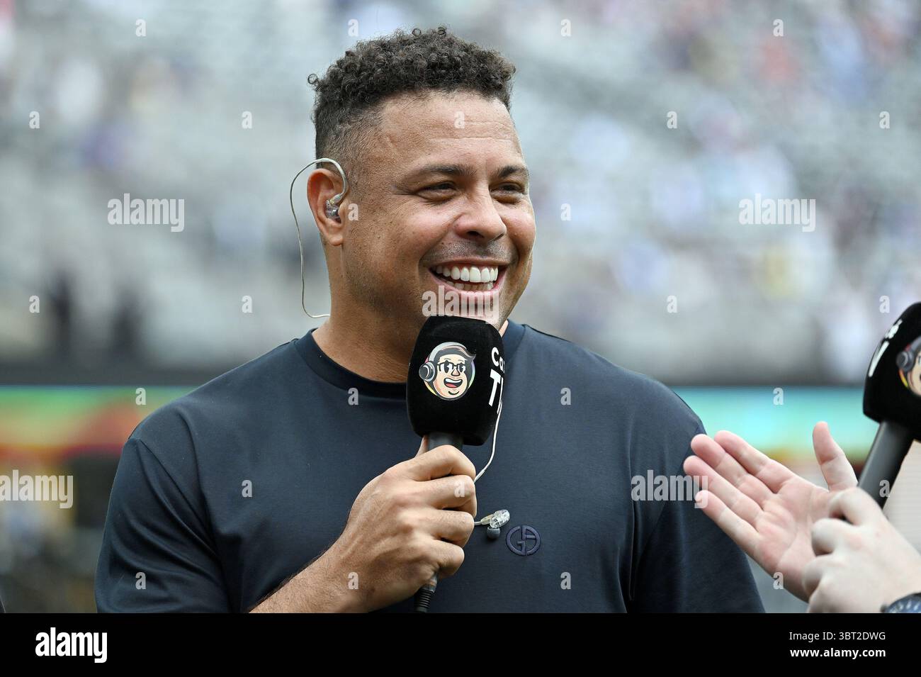 Former Brazilian soccer player Ronaldo Nazario seen on the pitch before ...