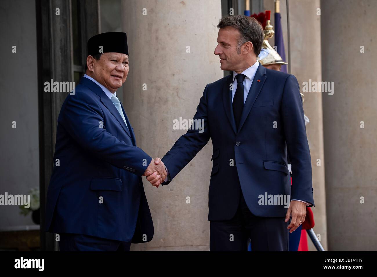 Prabowo Subianto Macron handshake Paris visit The Domino Effect: Who Wins, Who Loses?