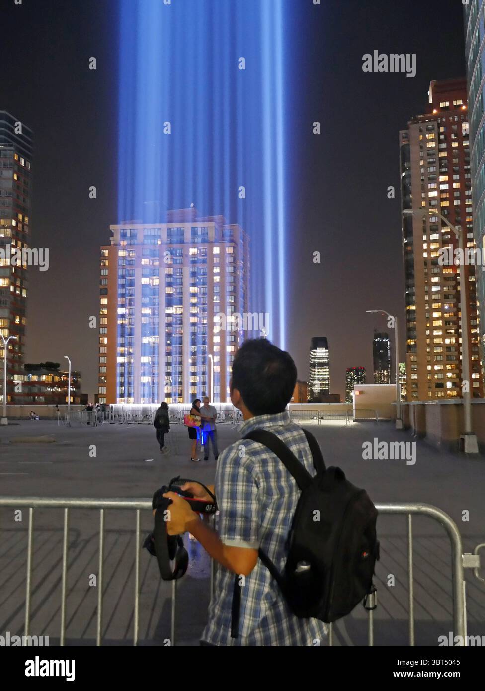 September 10, 2019 - New York, New York, USA - 9/11 Memorial Lights being tested the night before 9/11 on the rooftop of parking garage in lower Manhattan. Seen from adjoining rooftop. (Credit Image: © Milo Hess/ZUMA Wire) Stock Photo
