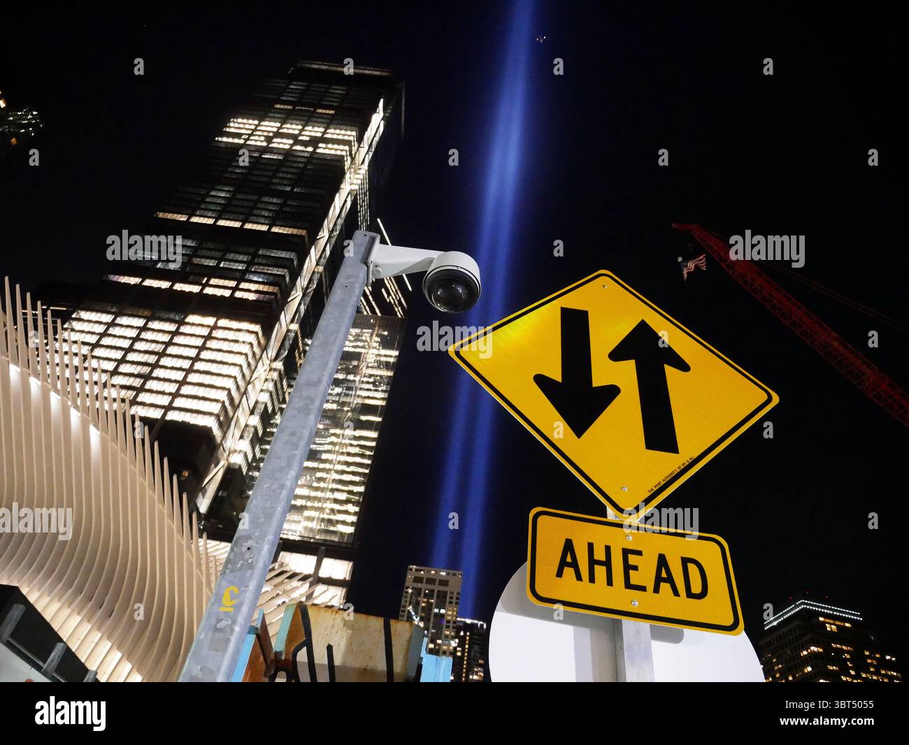 September 10, 2019 - New York, New York, USA - Testing the 9/11 Memorial Lights with a traffic sign seemingly depicting the fall and rise of lower manhattan.  (Credit Image: © Milo Hess/ZUMA Wire) Stock Photo