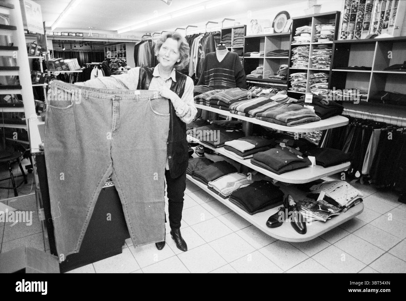 Denim jeans store Black and White Stock Photos & Images - Alamy
