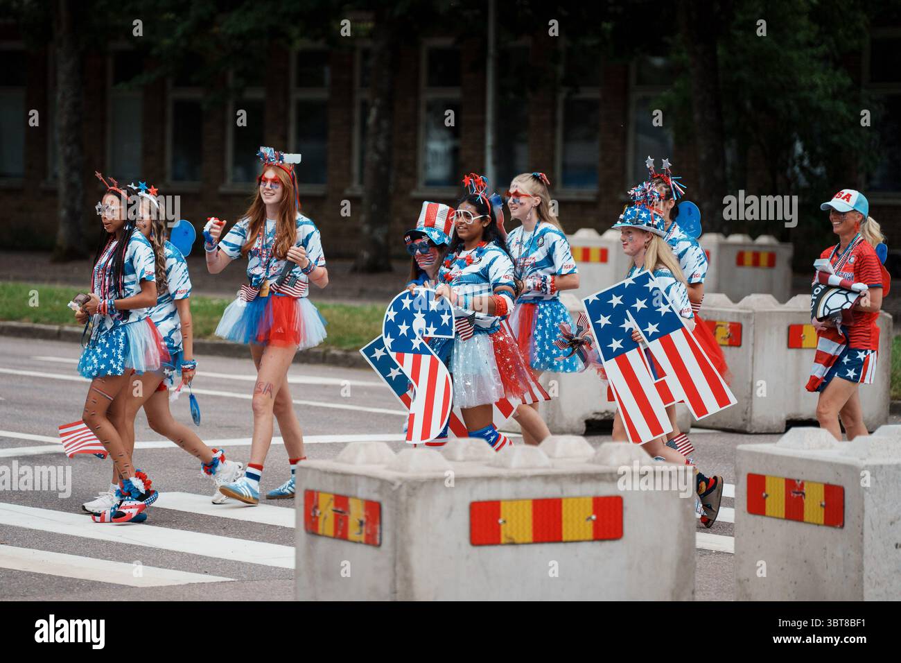 Gothenburg, Sweden. 14th July, 2025. Gothenburg, Sweden, July 7th 2025 Supporters from the USA walk joyfully through the streets dressed in patriotic outfits during the Gothia Cup 2025 in Gothenburg, Sweden. (Gabor Baumgarten/SPP) Credit: SPP Sport Press Photo. /Alamy Live News Stock Photo