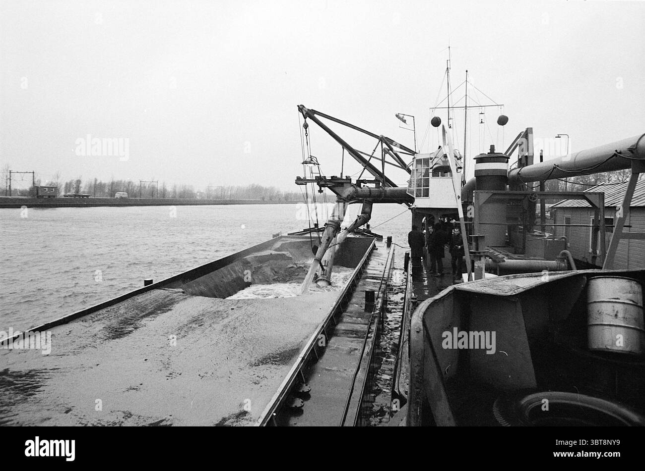 Mechanical loading arm Black and White Stock Photos & Images - Alamy