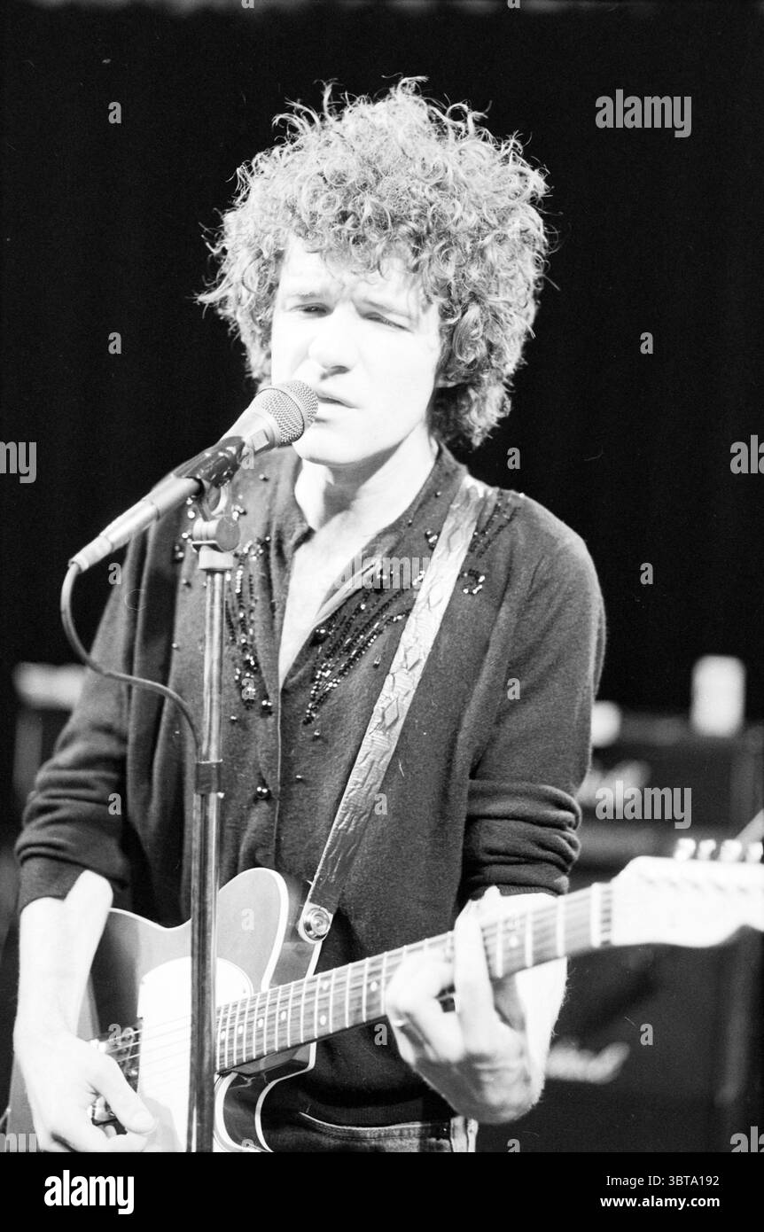 Focused young singer singing Black and White Stock Photos & Images - Alamy