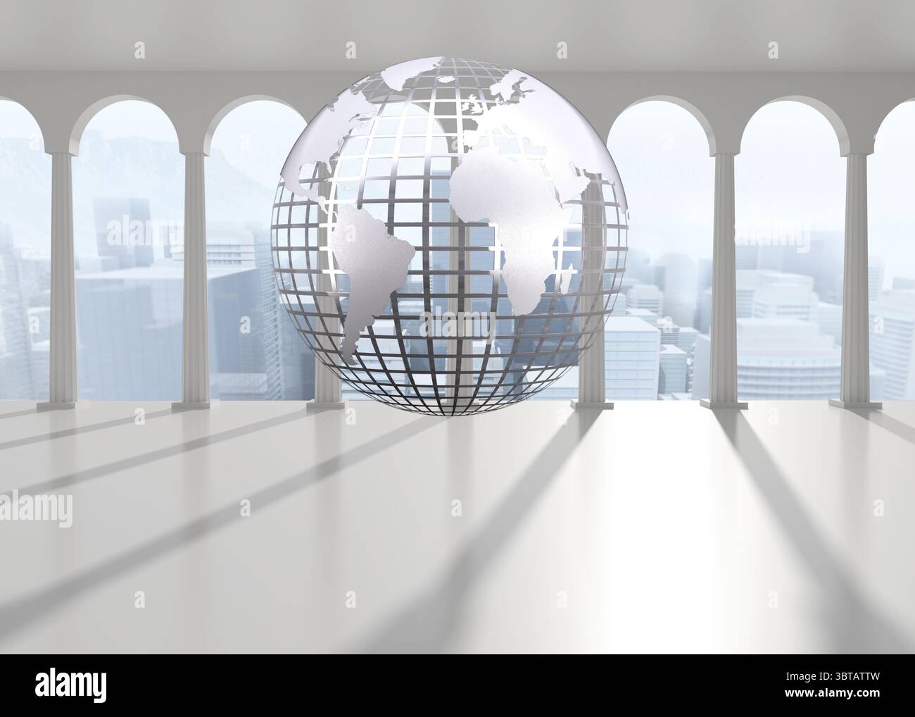 Silver globe floating in room Stock Photo