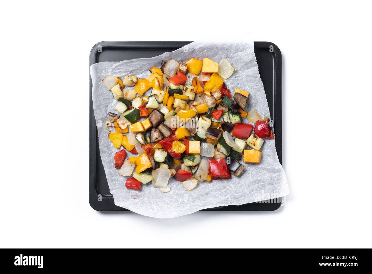 Roasted vegetables isolated on white background Stock Photo