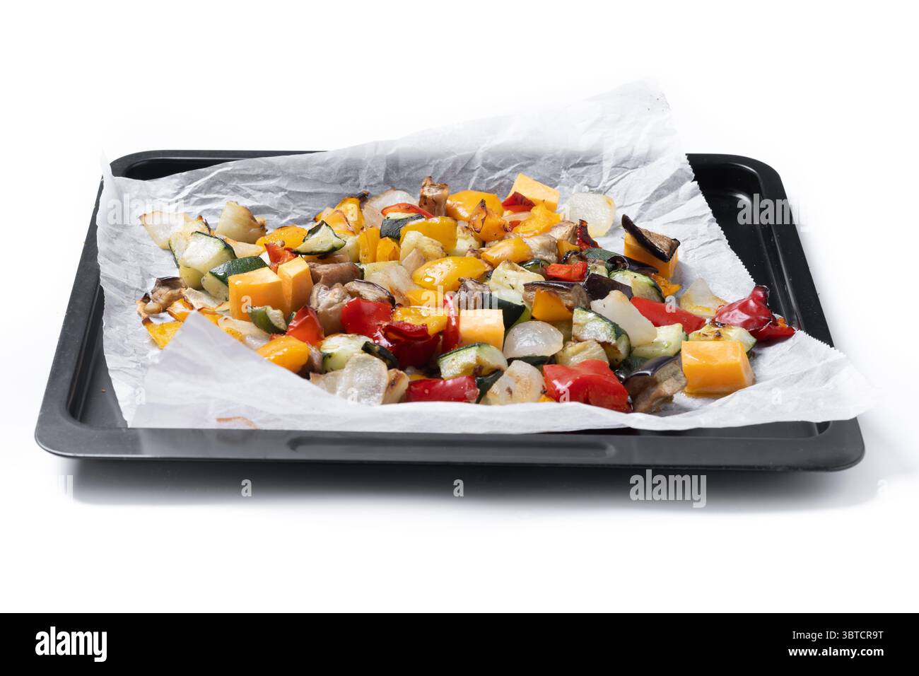 Roasted vegetables isolated on white background Stock Photo