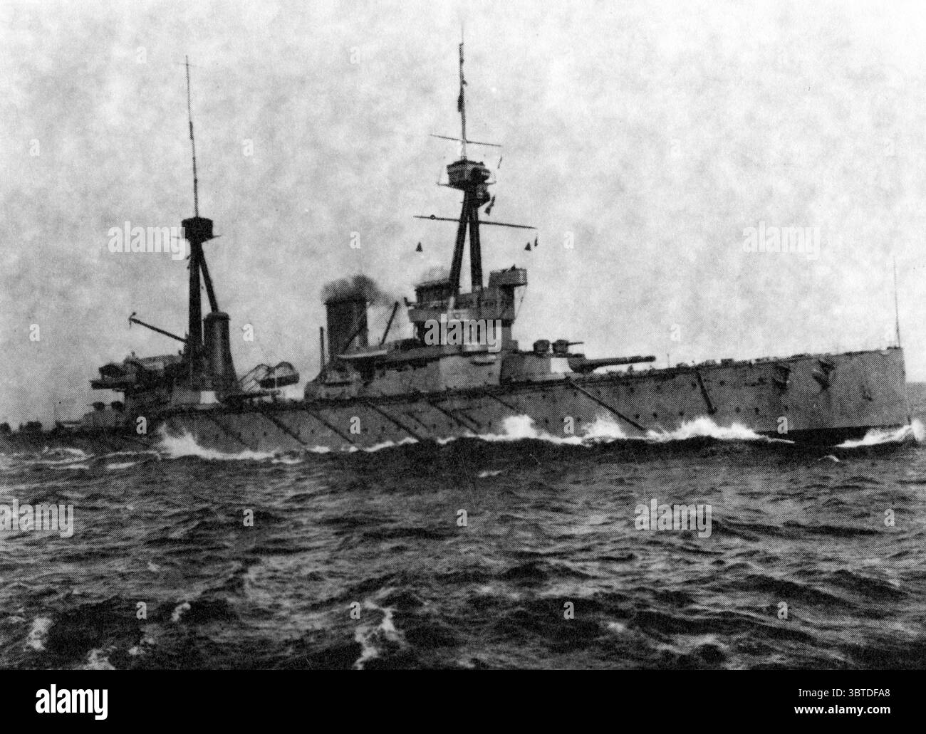 Sturdee ' s flagship HMS Invincible was an Invincible-class battlecruiser . HMS Inflexible was her sister ship . Stock Photo