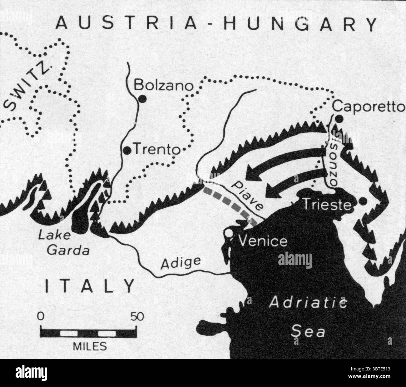 In Italy the ALps were the chief strategic factor . The heavy jagged line on the map marks their southern boundary . The main action was along the Isonzo River at the eastern end of the frontier . Arrows mark the German Austrian attack from Caporetto which drove the Italians to the Piave River ( broken line ) Stock Photo