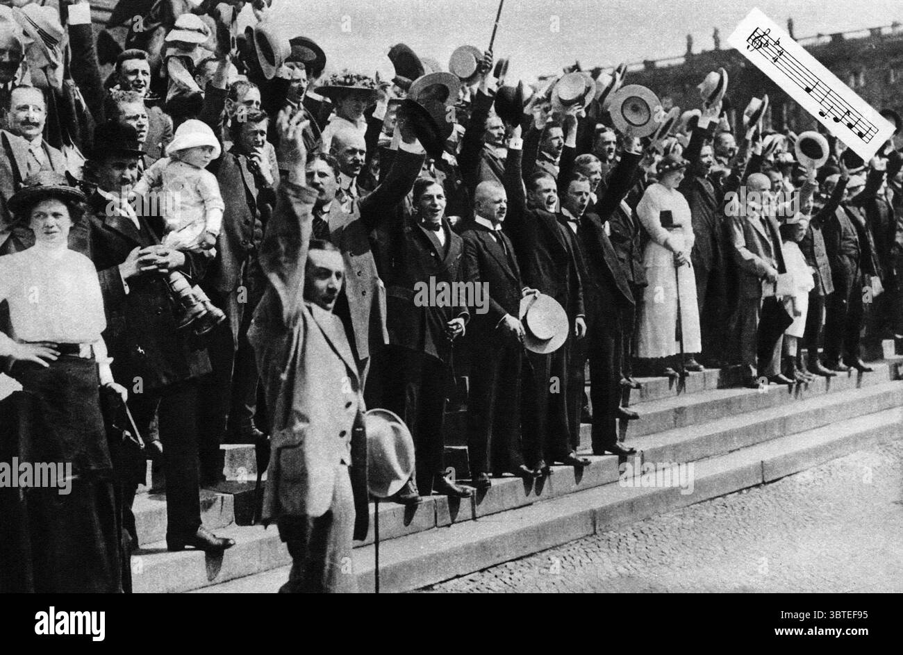 Deutschland Uber Alles : Crowds gather on the steps of Unter den Linden , the tree lined boulevard of Berlin , Germany at the onset of WWI Stock Photo