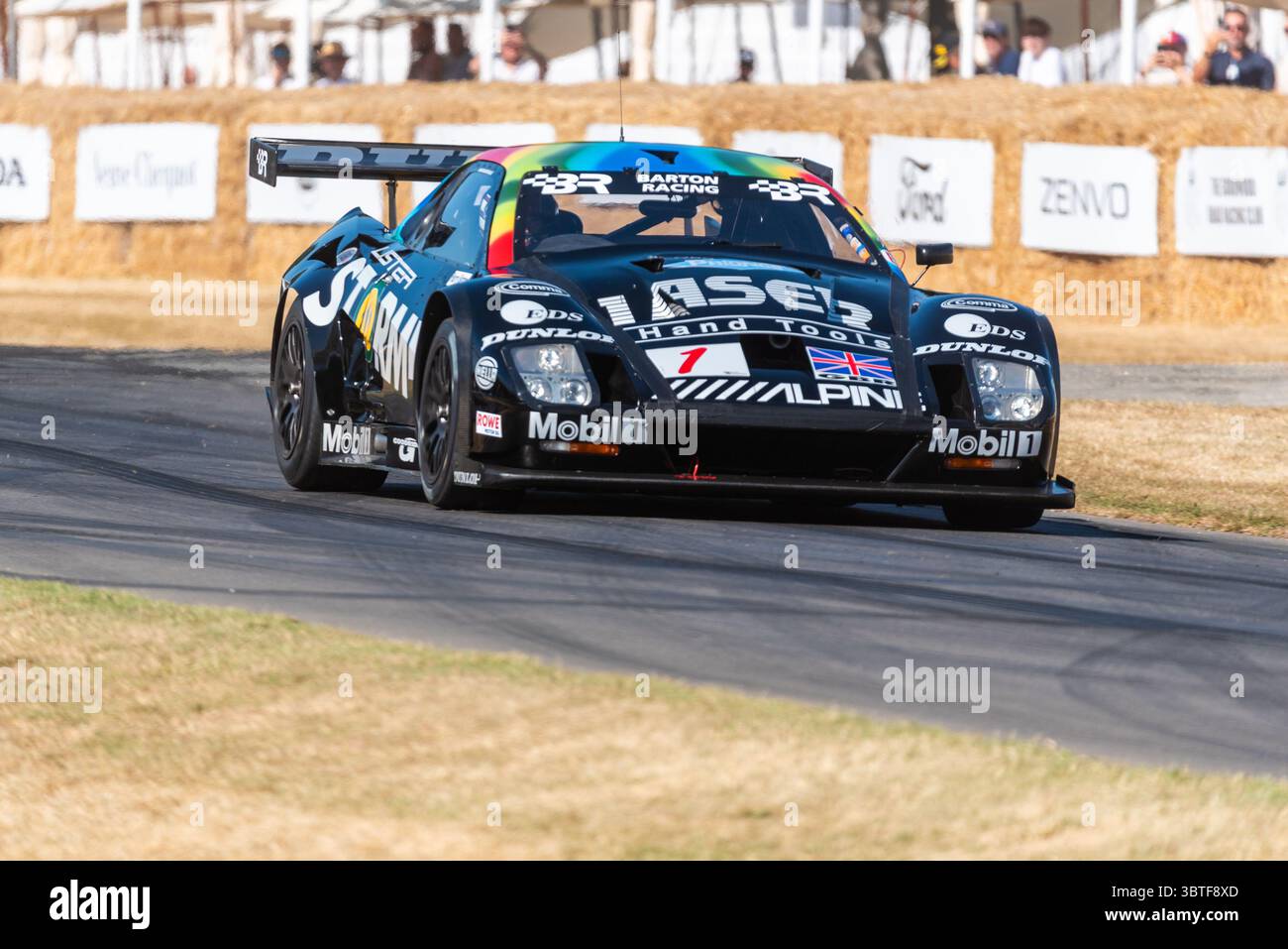 Lister Racing Cars 2001 Lister Storm GT racing car driving up the hillclimb track at the ...