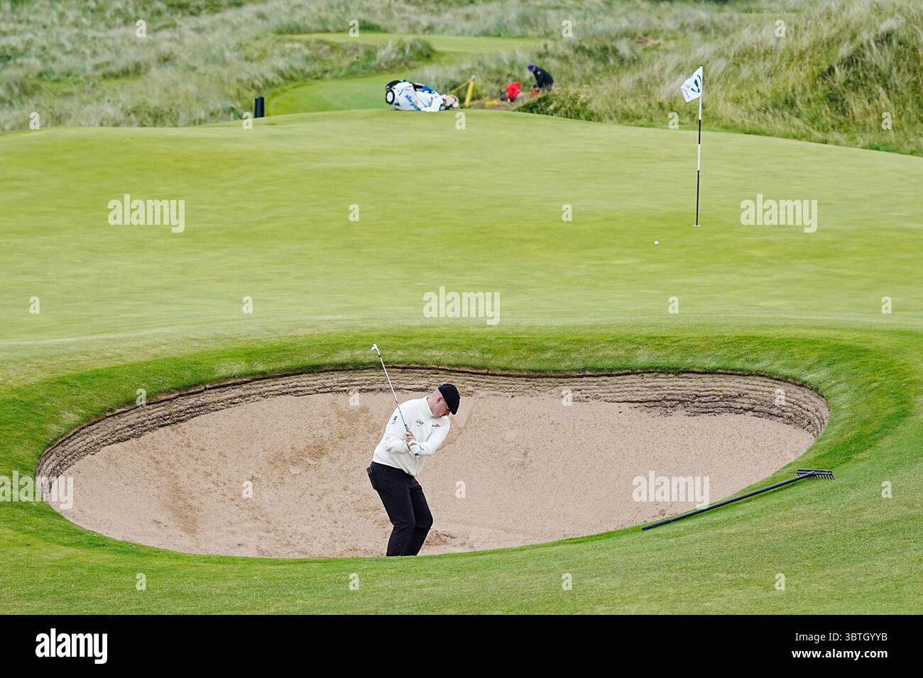 England’s Harry Hall clips from the bunker during the third preview day