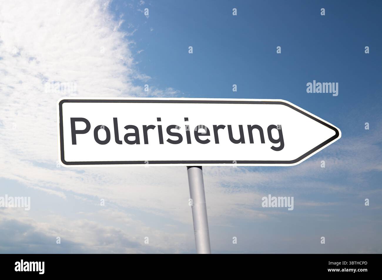 (Photomontage) Directional arrow labelled POLARISIERUNG Stock Photo