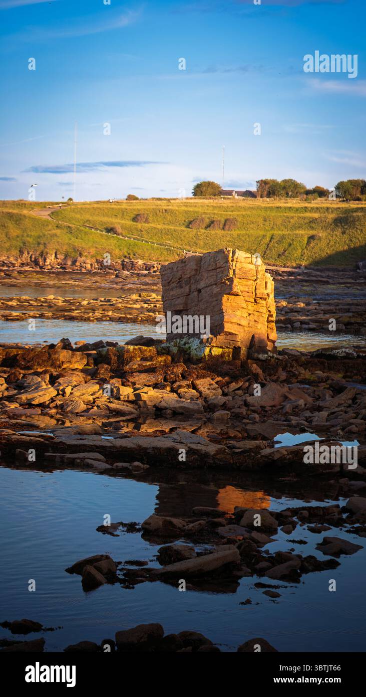 The image shows a prominent rock formation known as 