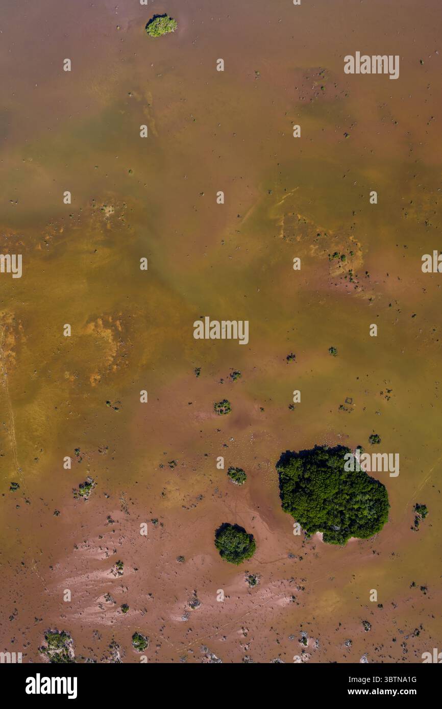 Aerial view of the earth's canvas painted with hues of rust and gold ...