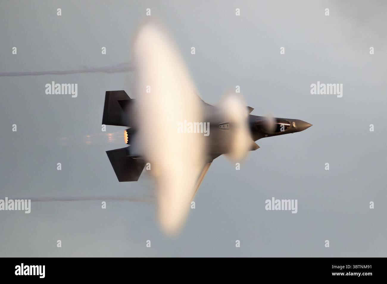 U.S. Air Force F-35 Lightning II from the 495th Fighter Squadron (RAF Lakenheath) in flight generating vapor cones.. Sanicole, Belgium - September 10, Stock Photo