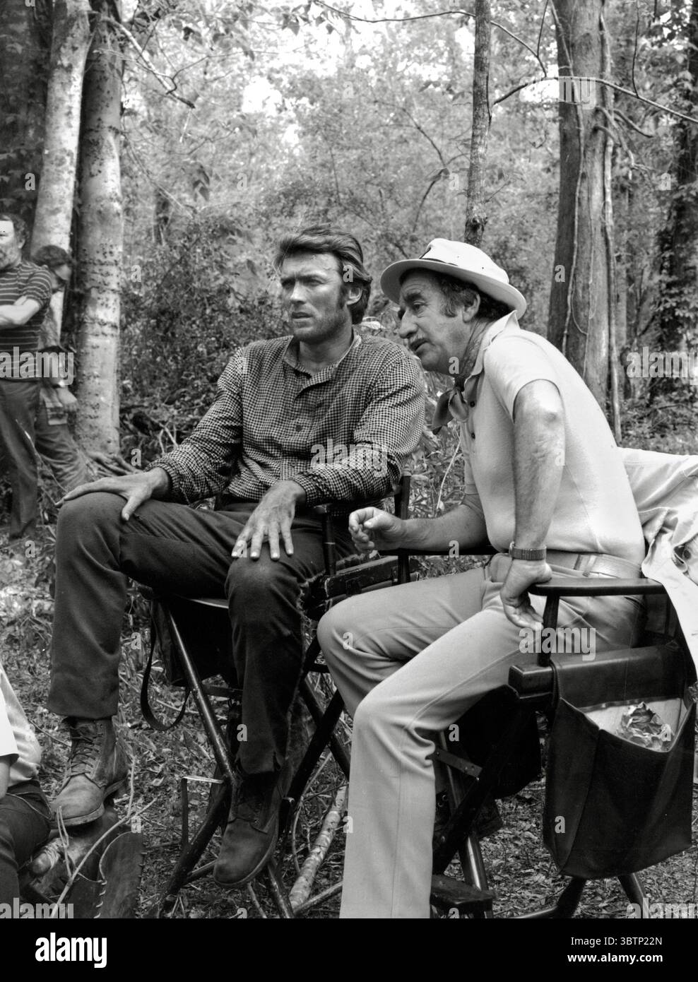 Clint Eastwood, and director Don Siegel on location filming "The