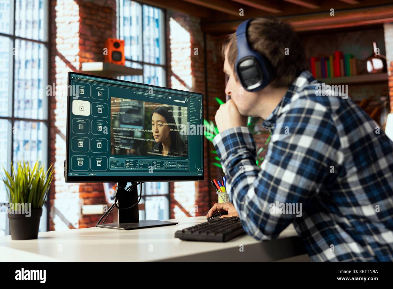 Graphic editor at workstation arranging interface elements in PC software, positioning buttons, placing text input fields for AI GPT functions, linking output controls, structuring navigation menus Stock Photo