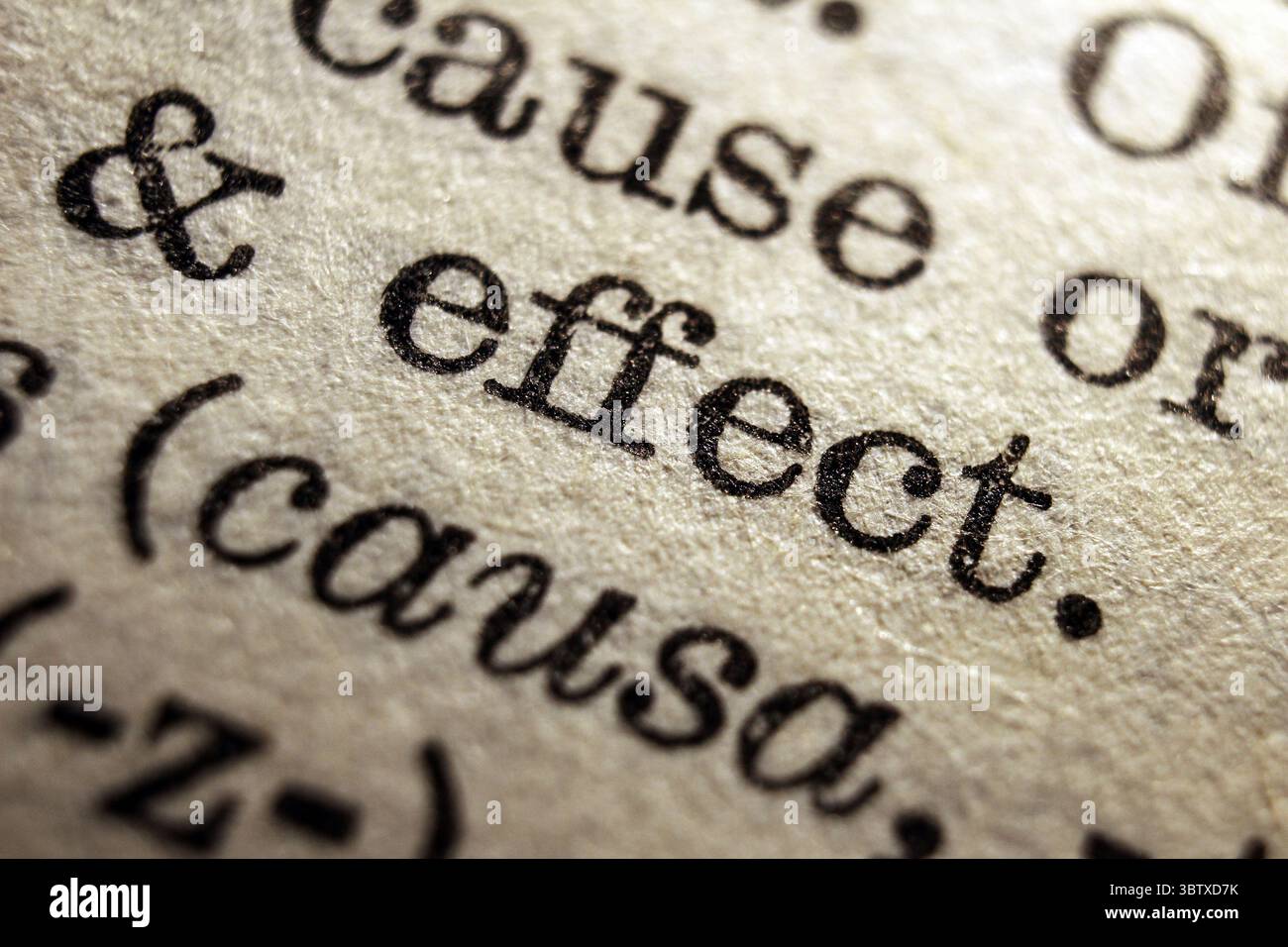 Words effect and causa on dictionary page, macro close-up Stock Photo