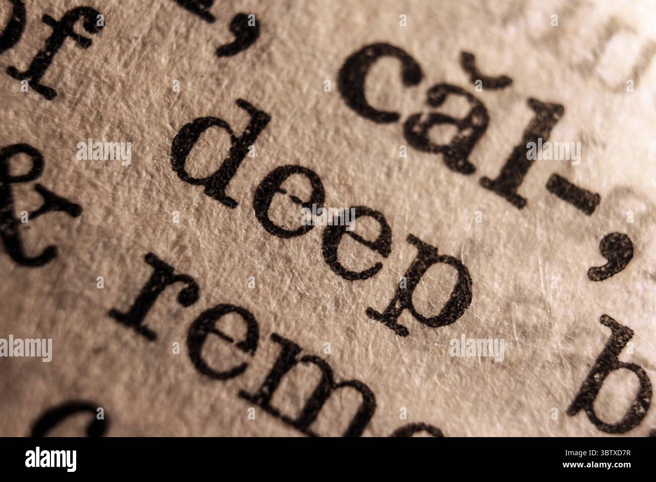 Word deep on dictionary page, macro close-up Stock Photo