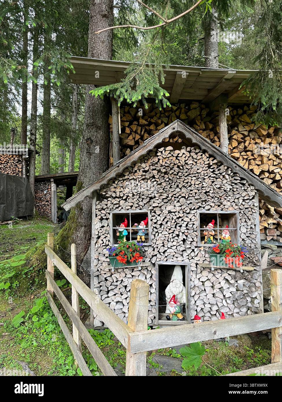 Traditional Houses Near Uri Waterfall in Altdorf, Switzerland – Scenic Mountain Landscape in the Swiss Alps. - Smartphone Captured Stock Image