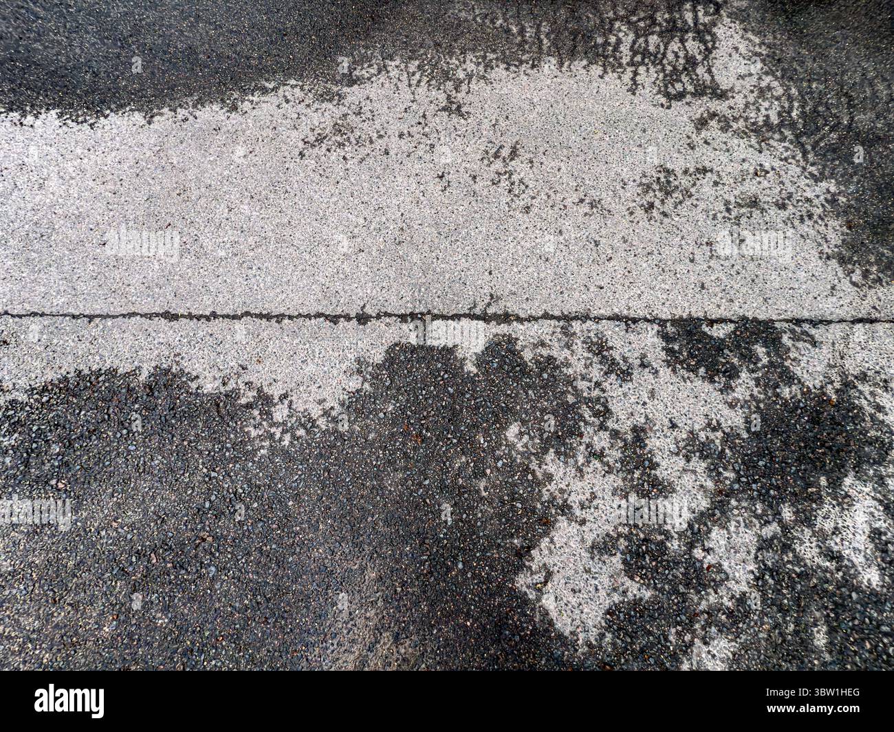 half-wet-asphalt-road-texture-asphalt-sidewalk-after-rain-closeup