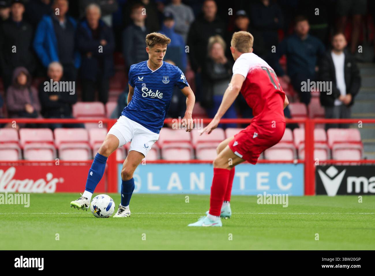 Accrington, England, 15th July 2025. Harrison Armstrong of Everton runs ...