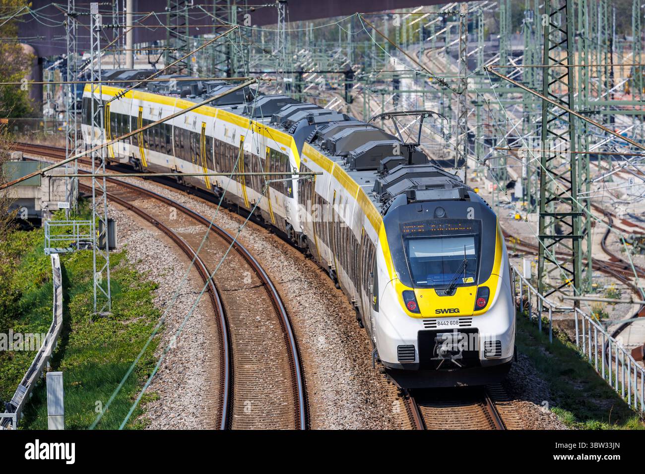 Stuttgart, Germany - April 10, 2025: Regional train of SWEG type Bombardier Talent 2 in Stuttgart Untertürkheim, Germany. Stock Photo