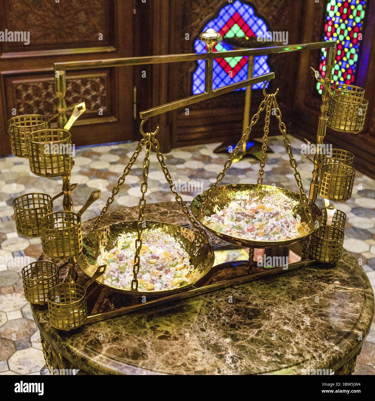 Old style arabic golden scale close up Stock Photo - Alamy