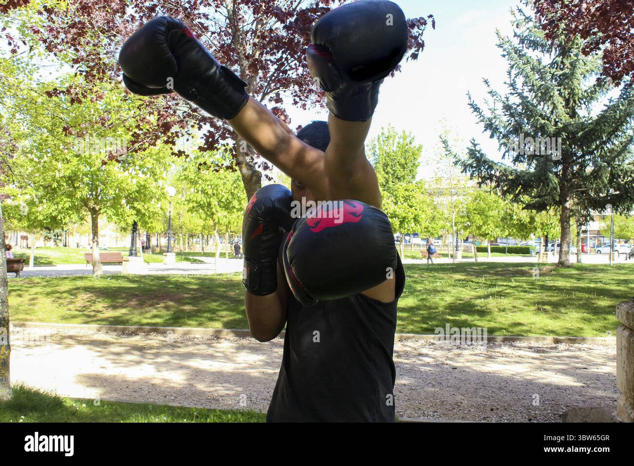 Latin boxer performing a sequence of blows directed in all directions ...