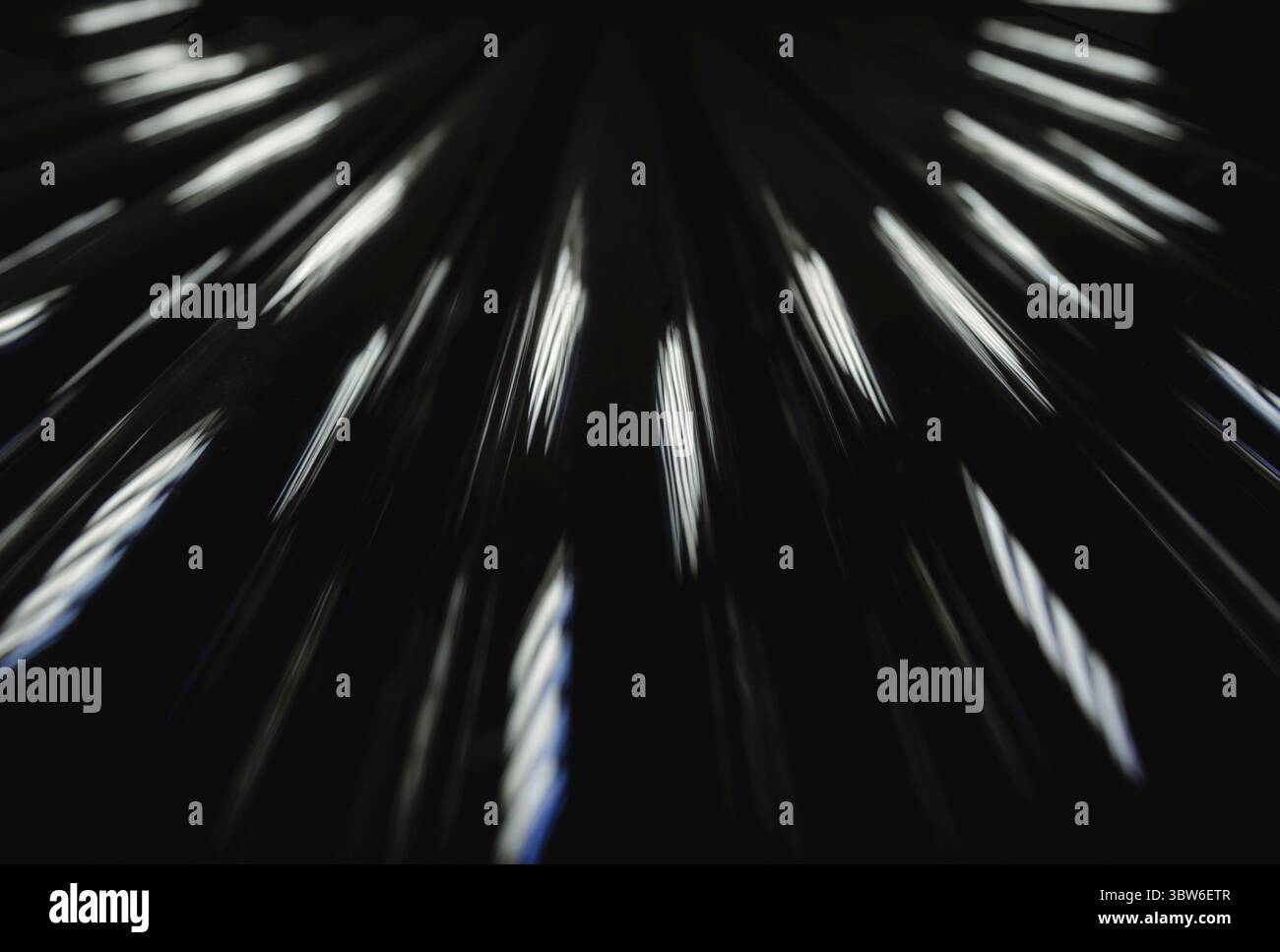 Glare light in the dark perspective view abstract background pattern Stock Photo