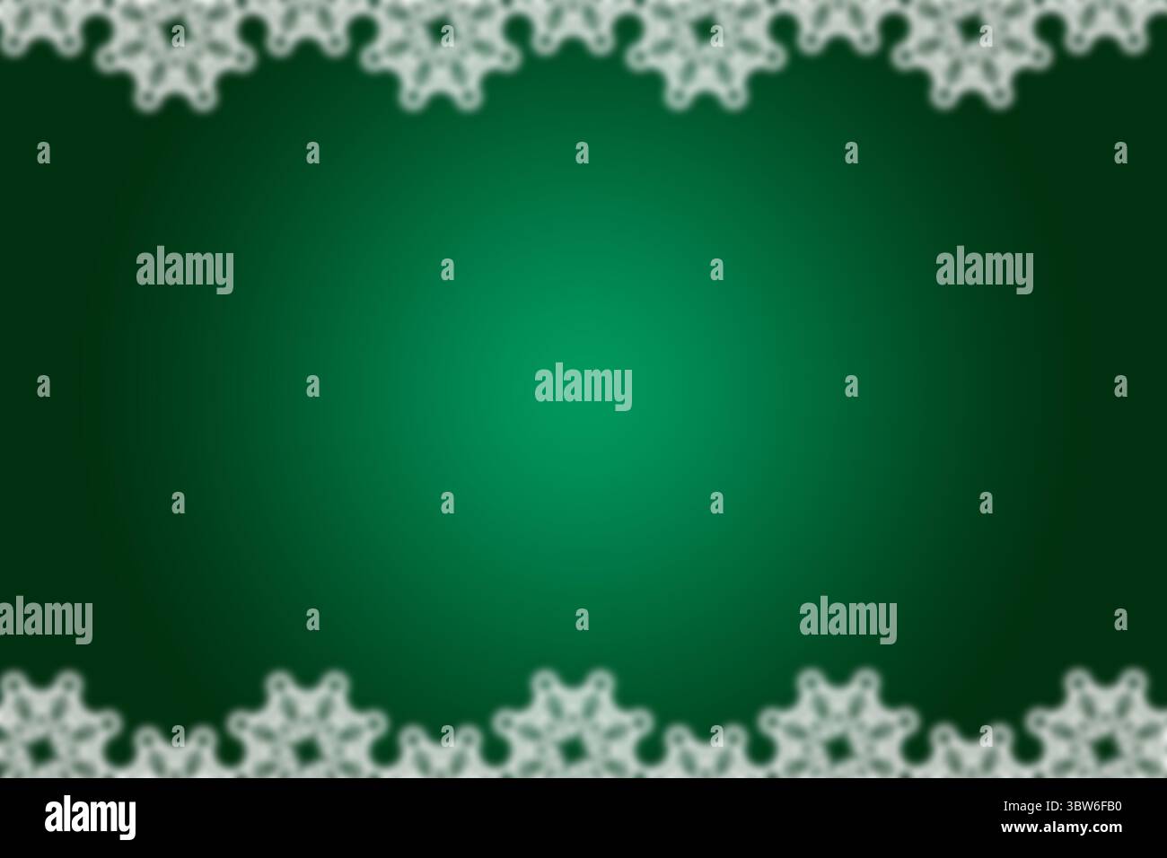 Flat design backdrop is featuring white snowflake borders with soft center glow on green gradient Stock Photo