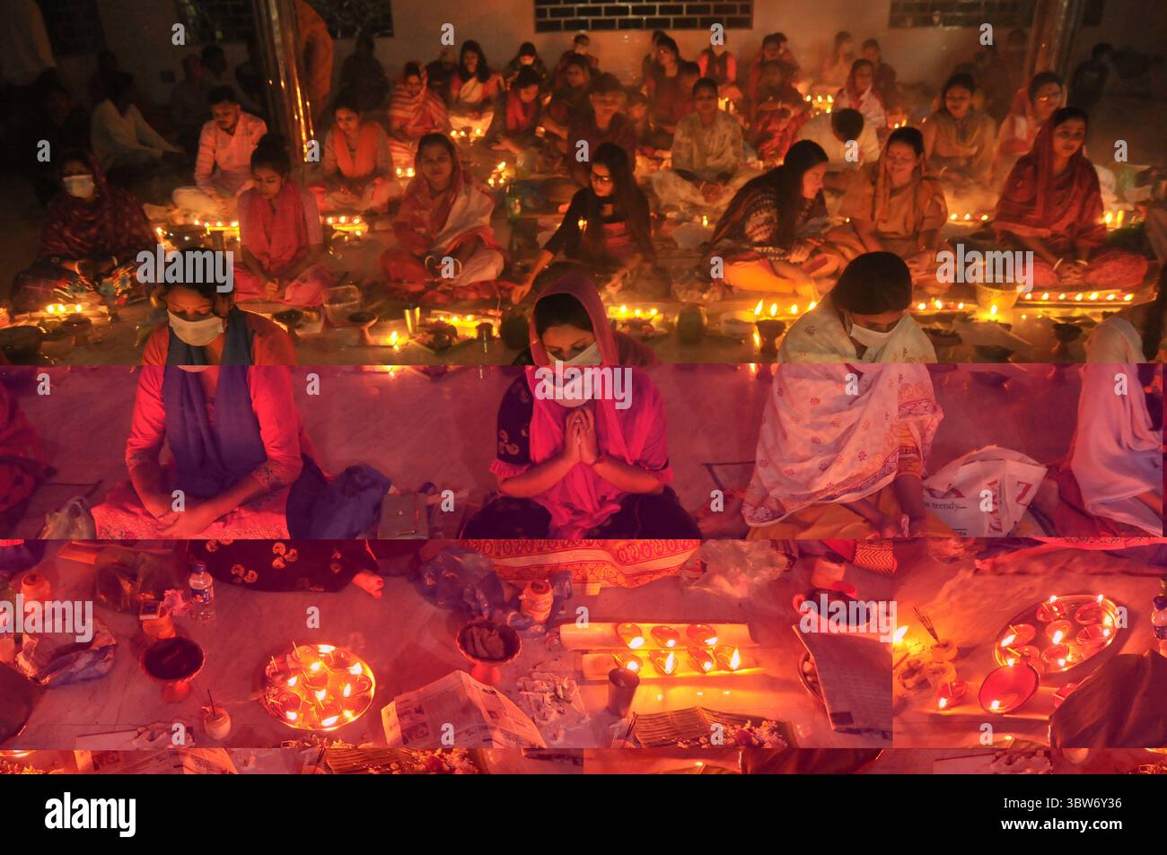 November 10, 2020: Under the Shadow of Corona Virus, Hindu devotees sit together on the floor at Sri Sri Loknath Brommochari  babar Ashrom and Mondir temple to observe Rakher Upabash ritulas, in Korer Para, Sylhet, Bangladesh. (Credit Image: © Md Rafayat Haque Khan/ZUMA Wire) Stock Photo