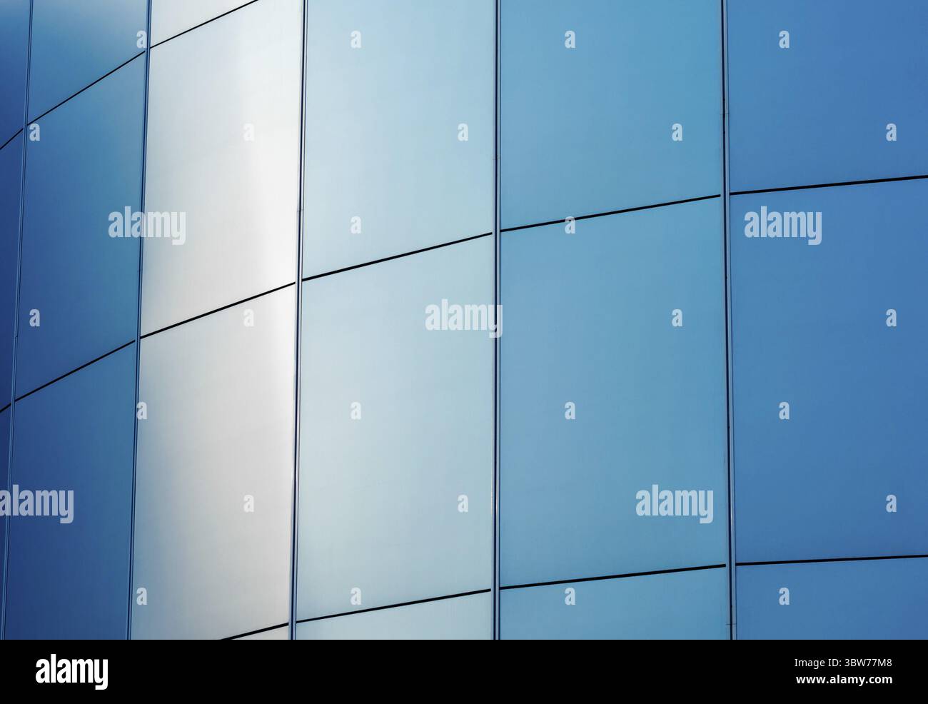 Wall of the building with blue panels Stock Photo - Alamy