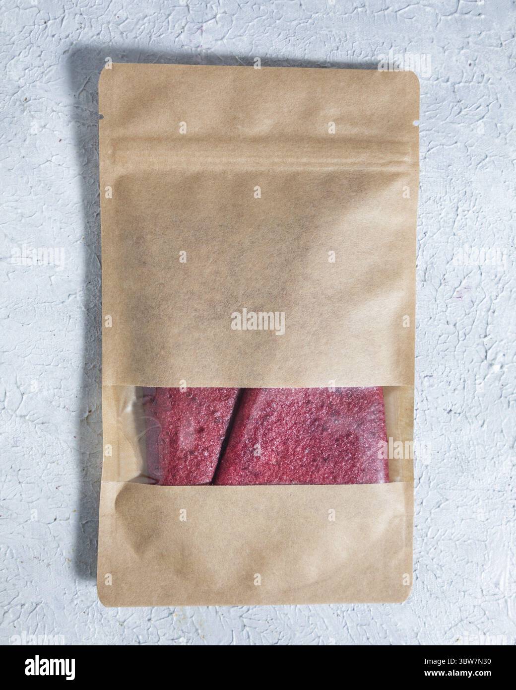 Dried cherry fruit lavash in paper package Stock Photo