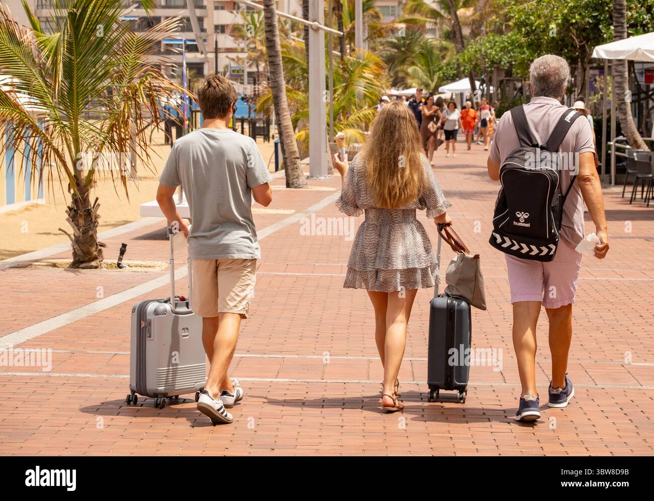 Las Palmas, Gran Canaria, Canary Islands, Spain.16th July, 2025. Tourists, many British, swelter on the city beach in Las Palmas as the midday temperature registers 38.7 degrees Celcius in the south of Gran Canaria. A cocktail of high temperatures and winds blowing in from the Sahara has activated an orange health and forest fire risk alert throughout the Canary Islands. Credit: Alan Dawson/Alamy Live News Stock Photo