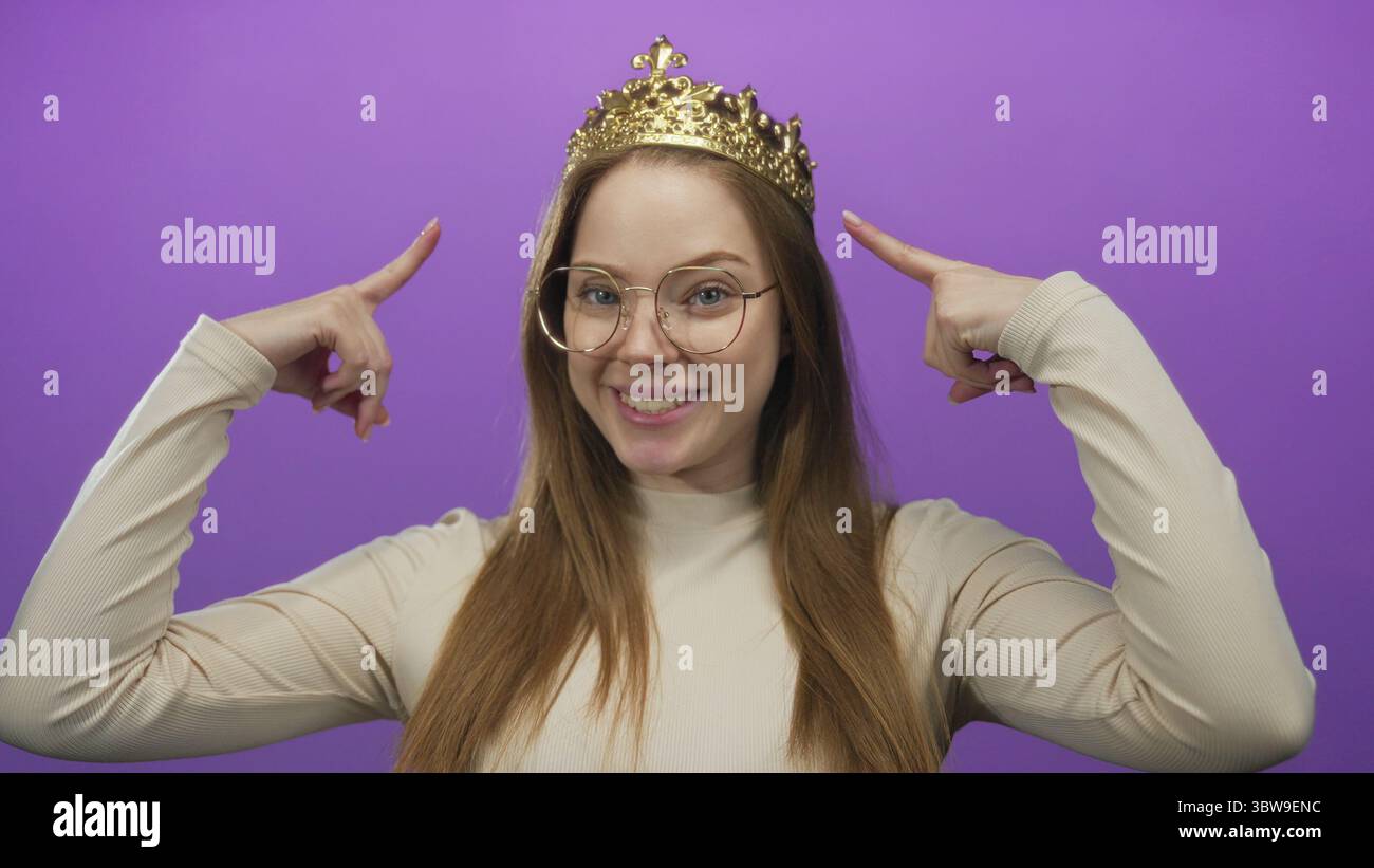 Woman wearing gold crown smiles hi-res stock photography and images - Alamy