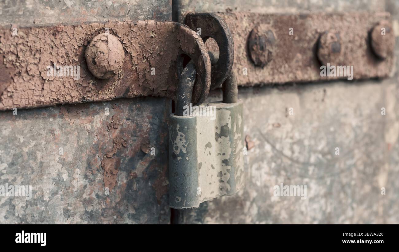 Old lock on an iron door close up Stock Photo