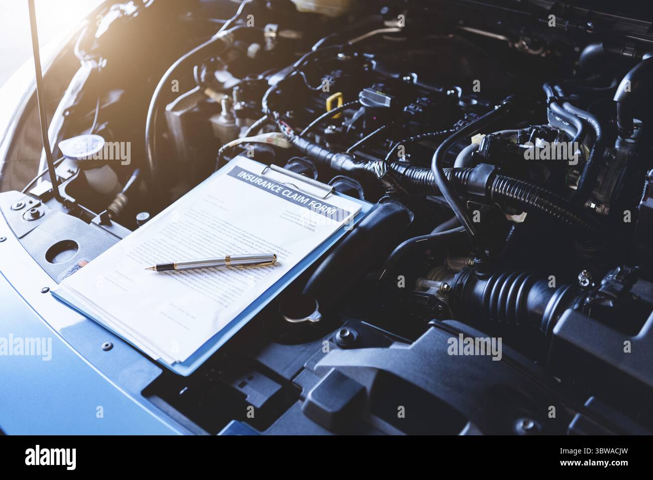 Clipboard on car with car insurance claim form for customer maintenance ...