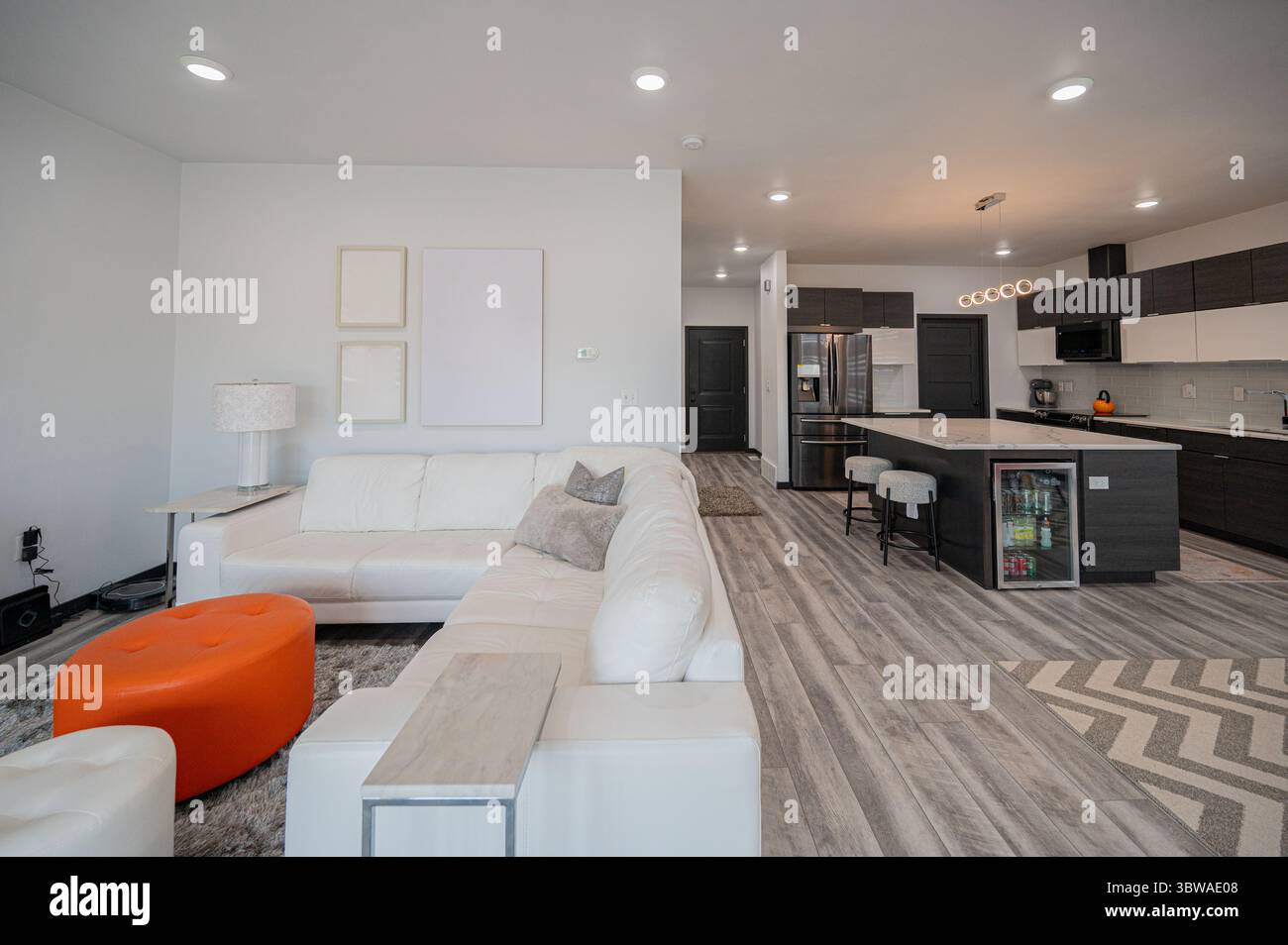 Modern Open Concept Living Room and Kitchen Interior Stock Photo - Alamy