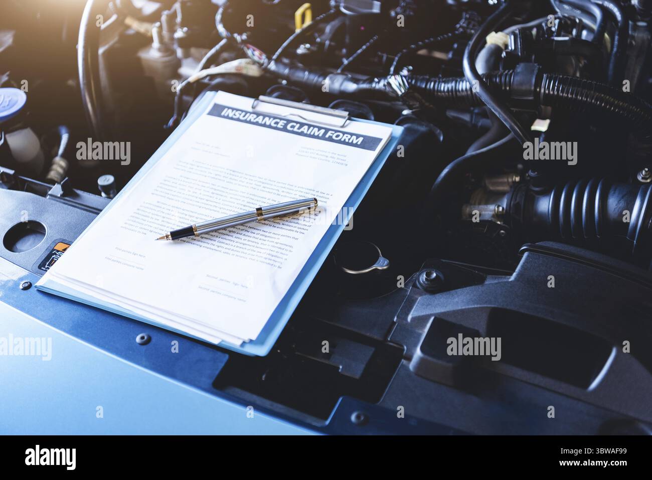 Clipboard on car with car insurance claim form for customer maintenance ...