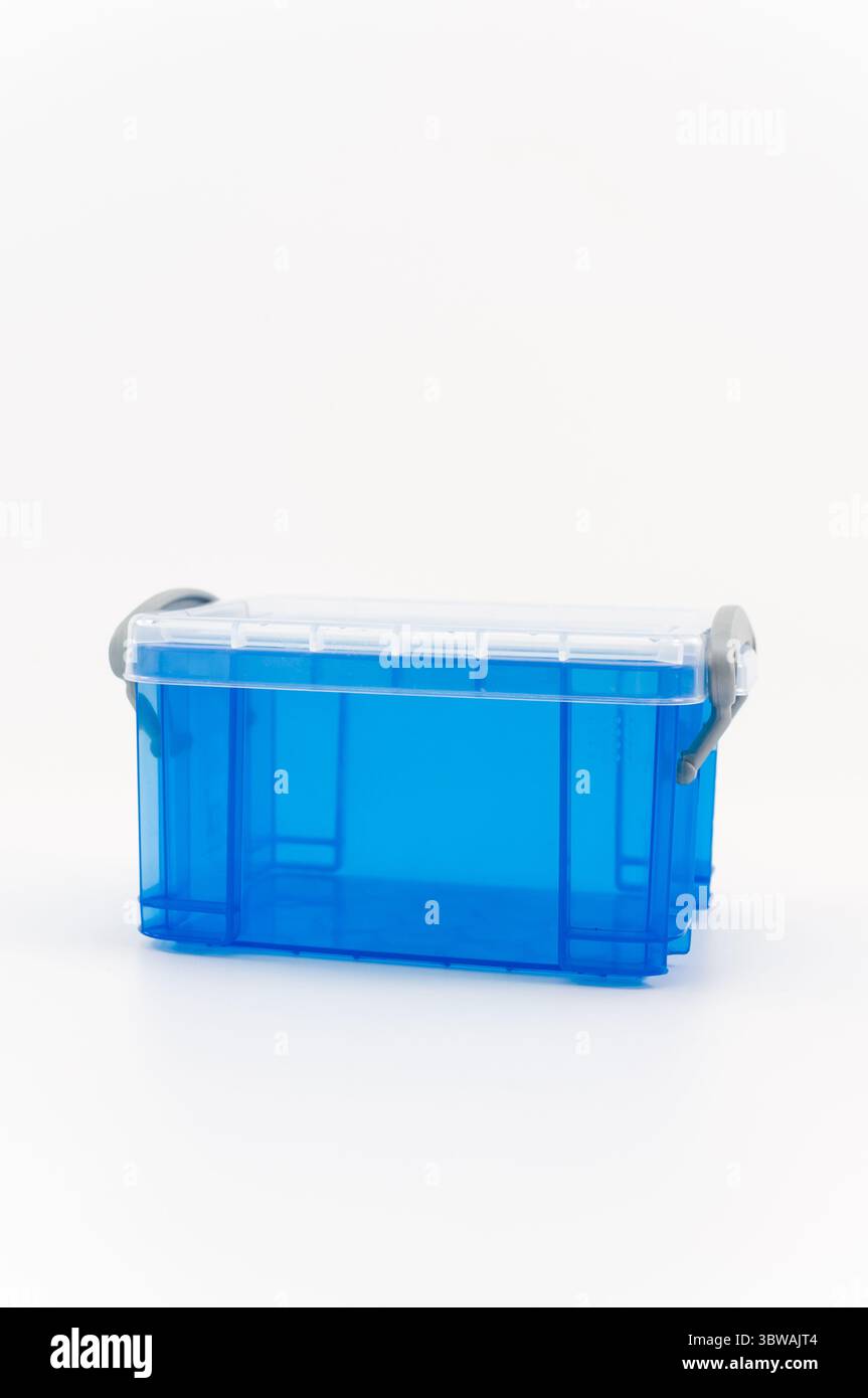 small transparent plastic containers on a white surface Stock Photo