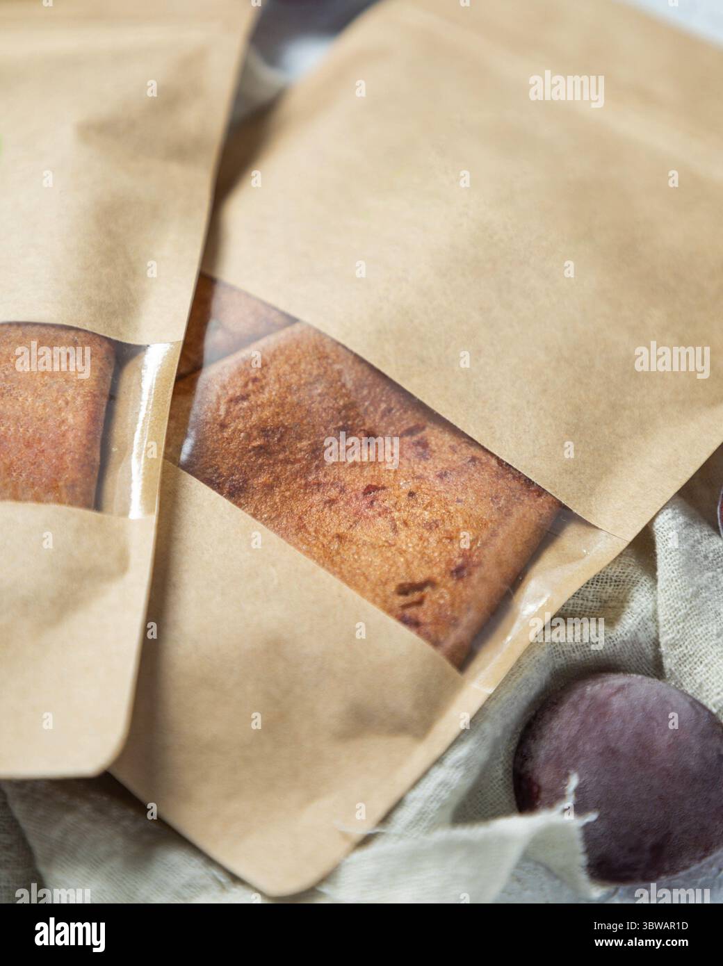 Dried plum fruit lavash in paper package Stock Photo