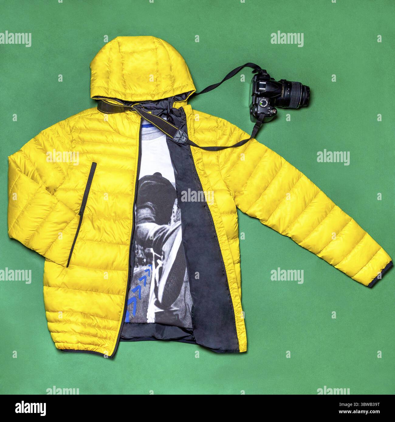 Yellow man jacket with a camera decor isolated Stock Photo