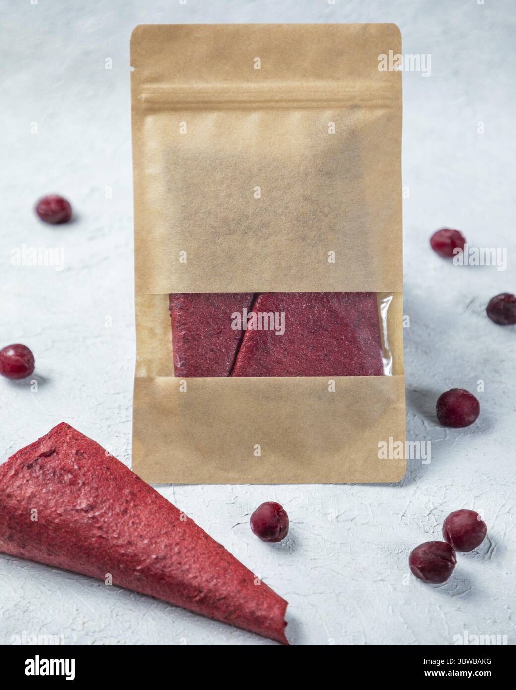 Dried cherry fruit lavash snack in paper package Stock Photo