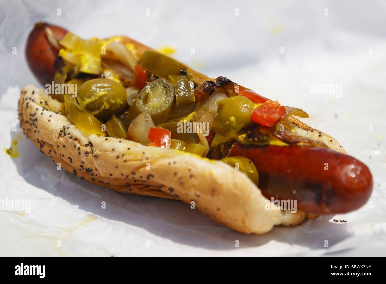 June 16, 2021: JPG Maxwell Street Polish topped with mustard, sauteed onions, and giardiniera from Fixin' Franks at Home Depot in Chicago's Avondale neighborhood on June 11, 2021. (Credit Image: © TNS via ZUMA Wire) Stock Photo