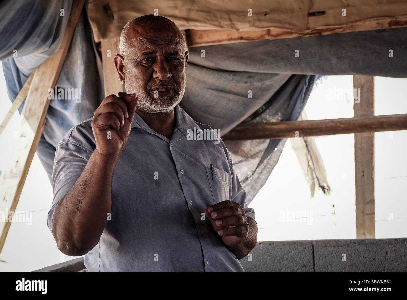 June 22, 2021, Bir Hadaj, Negev, Israel: ATIEH AL ASAM, Head of the regional Council of the unrecognized villages in the Negev, explains the uncertain future and threat of eviction under which Bedouins live in the unrecognized villages and home demolitions in the legal townships of illegal building. The decades long political battle for the unrecognized Bedouin villages and development of those already legalized in the Israeli Negev climaxes as the new Bennett - Lapid unity government depends on supporting votes from the four Knesset seats belonging to the Raam, United Arab List. (Credit Image Stock Photo