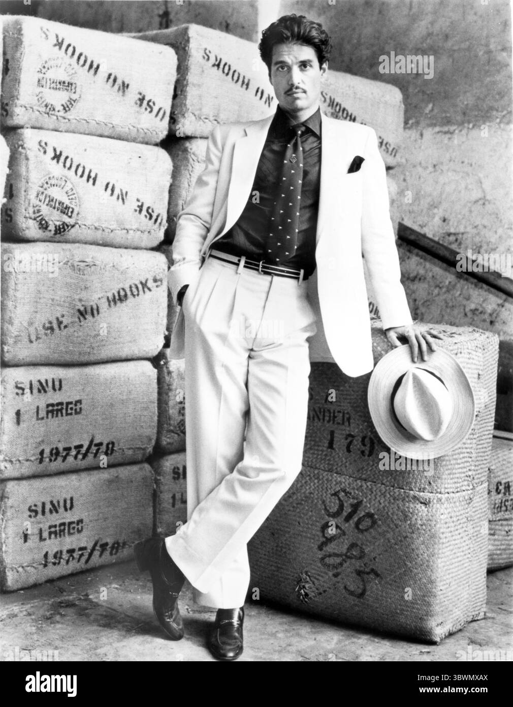 Chris Sarandon wearing a suit with stacked boxes (Credit Image: © Movie Star News via ZUMA Press Wire Service) Stock Photo