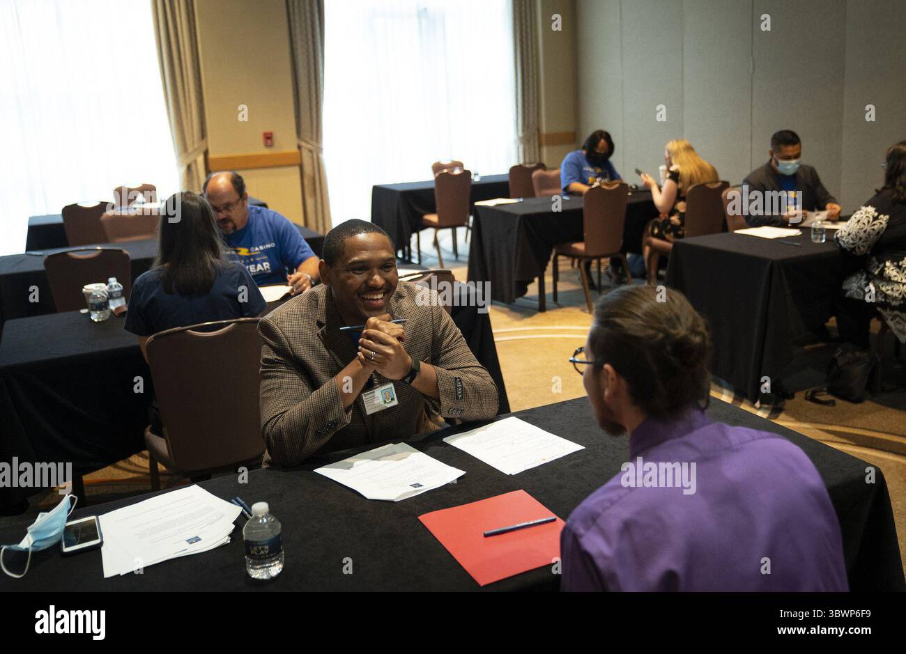 June 24, 2021: Rivers Casino talent manager Quinton James interviews an applicant for a dealer position during a job fair at the Hyatt Rosemont in Rosemont, Ill., on June 24, 2021. (Credit Image: © TNS via ZUMA Wire) Stock Photo